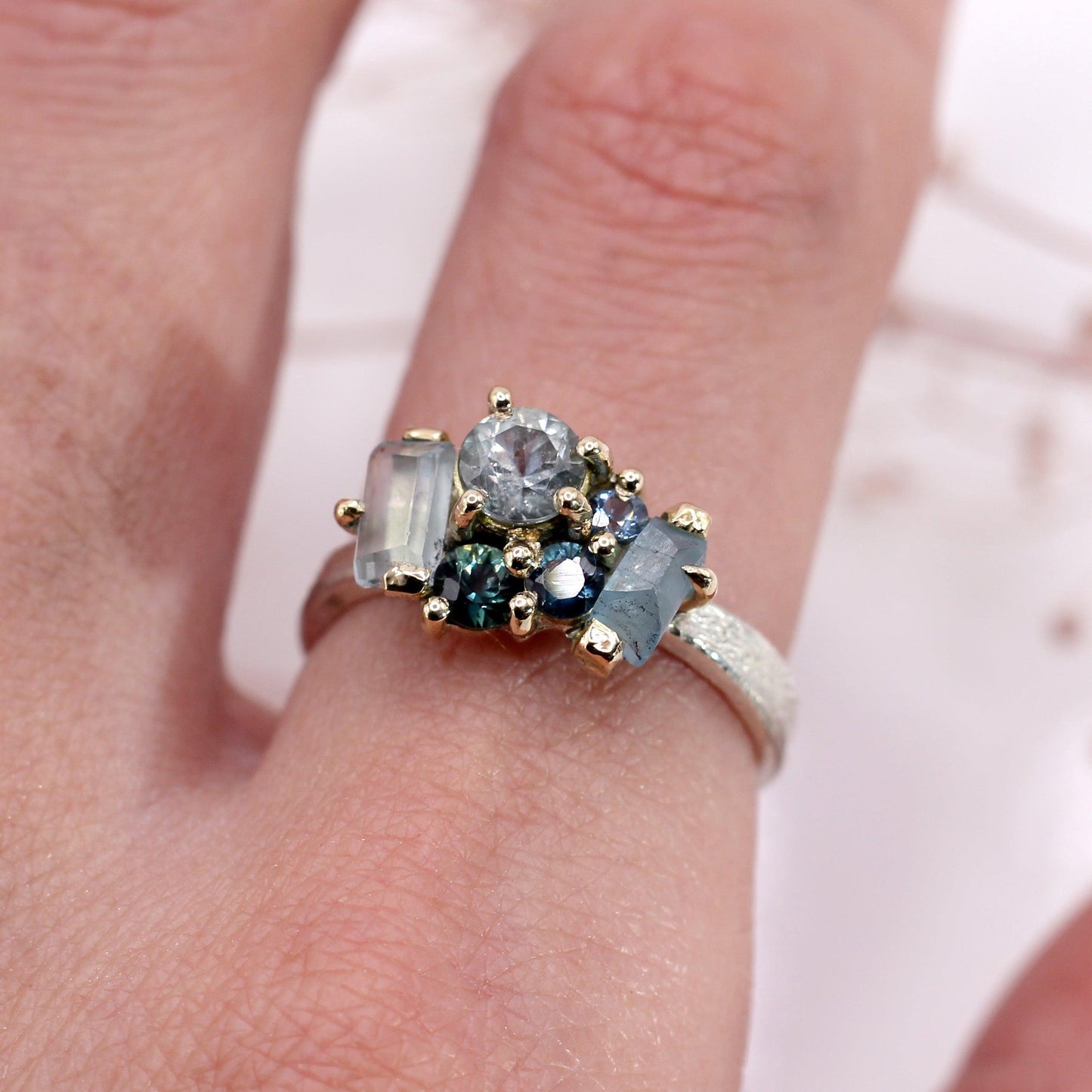 The Sarah Ring - Aquamarine and sapphire cluster ring in textured gold and silver