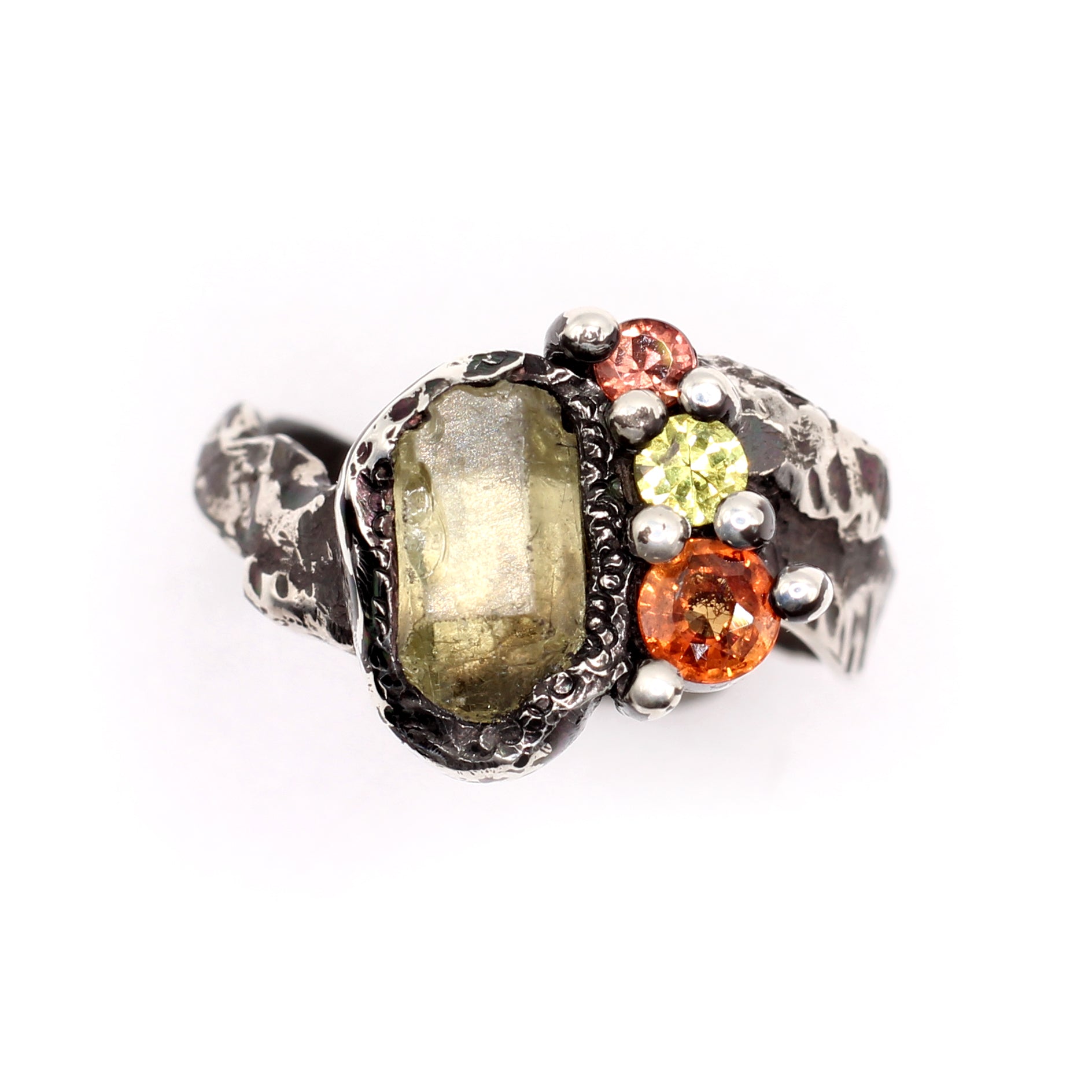 raw citrine and sapphire cluster in a rustic silver ring