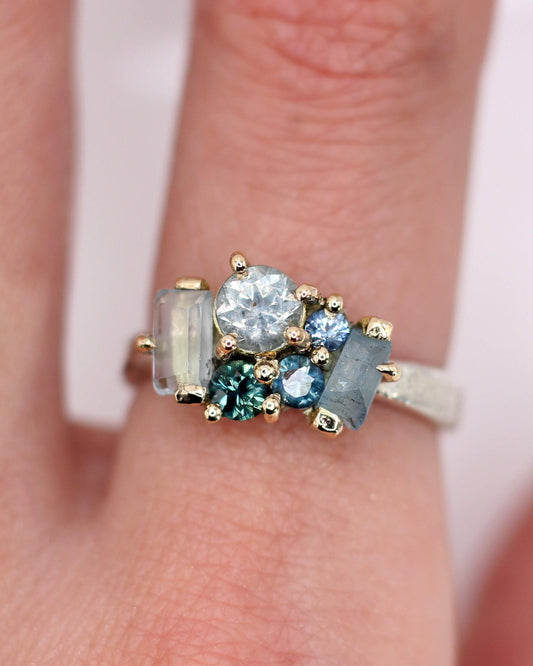 The Sarah Ring - Aquamarine and sapphire cluster ring in textured gold and silver
